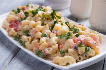 Homemade macaroni salad with vegetables