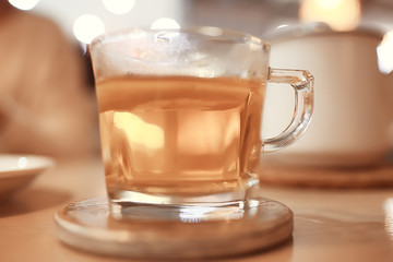 English tea in a cafe / cup and kettle with five o'clock tea