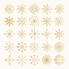 Set of hand drawn golden snowflakes