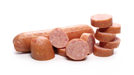Sausages with slices isolated on white background
