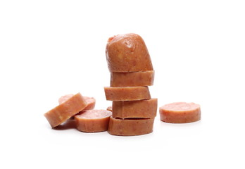Sausages with slices isolated on white background