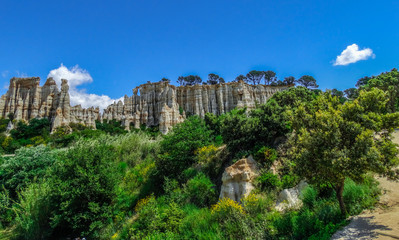Fototapeta na wymiar Orgues Ille sur Tet l limestone chimneys with sunlight and blue sky, Languedoc Roussillon, France