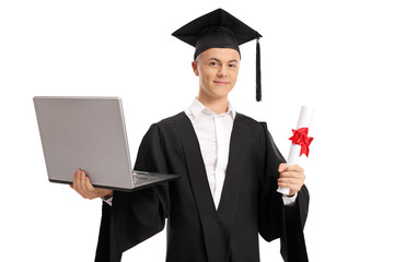 Graduate student holding a laptop and a diploma