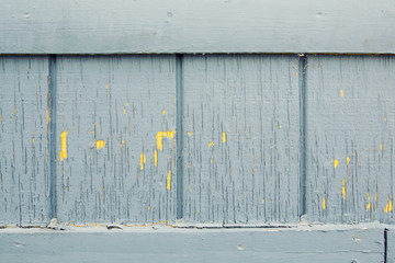 Vintage wood background with peeling paint.