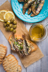 Sardine fish sandwich with garlic and olive oil