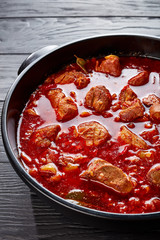 Carne Adobada in a black casserole