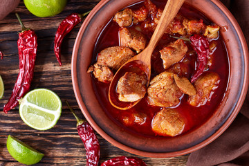 Carne Adobada in a clay bowl