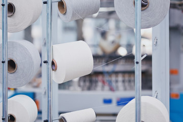 Knitted fabric. Textile factory in spinning production line and a rotating machinery and equipment...