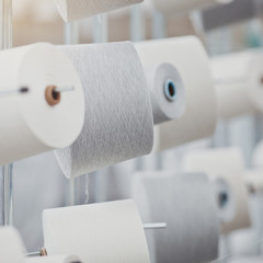 Knitted fabric. Textile factory in spinning production line and a rotating machinery and equipment...