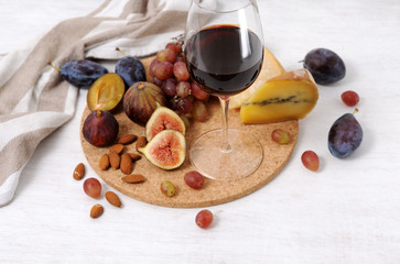 wine, cheese and fruits