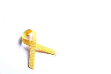 Yellow ribbon - bladder, liver and bone cancer awareness symbol. Children cancer prevention...