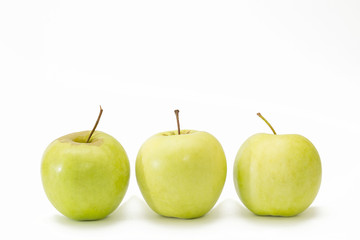 three apples on isolated background