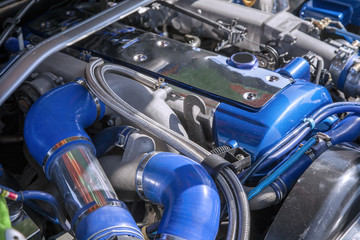 Engine under the hood of the car, Sport air filter in a gasoline. Turbocharged car engine. Car...