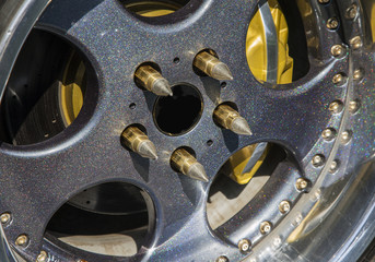Chromed car wheels with disc brakes, close-up