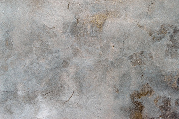 Old wall with cracks in retro style. Gray concrete background.