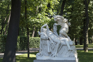 Sculptural composition of the Summer Garden " Cupid and Psyche". Copy. Old Public park "Summer Garden" in St. Petersburg, Russia.