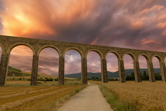 The aqueduct of Navarra at golden sunset