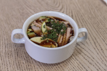 Okroshka as Russian traditional cold soup with kvass.