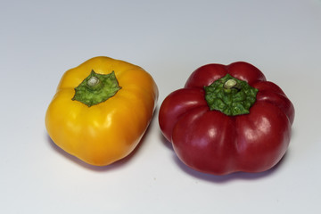 Fresh ripe pepper on white background.