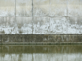 dirty wall with water reflection