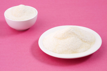Collagen protein powder - Hydrolyzed. Pink background
