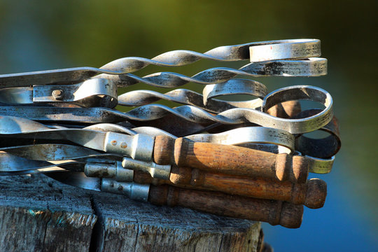 Handles of old metal skewers