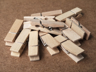 Wooden clothespins on wood table