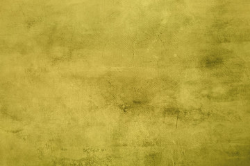 golden grungy canvas background or texture
