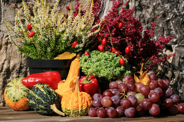 Picturesque small decoration in farm in Poland.  Vegetable with heathers composition. Autumn crops, harvest festival at the end of summer. Halloween.