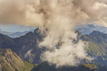 Fototapeta premium Beautiful summer scenery in the Dolomite Alps, Italy, with dramatic storm clouds