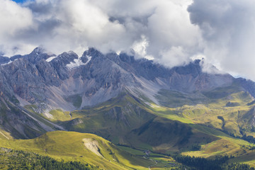 Beautiful summer scenery in the Dolomite Alps, Italy, with dramatic storm clouds