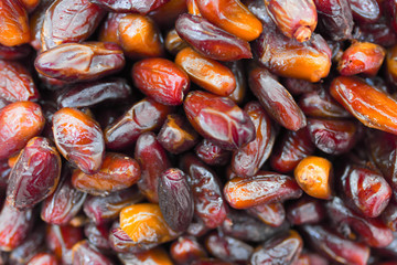 Background of dried dates of fruits close-up
