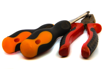 Naklejka premium Pliers and screwdrivers on a white background