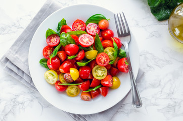 Tomatoes salad with basil