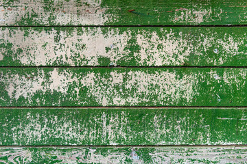 Wooden background with old peeling paint