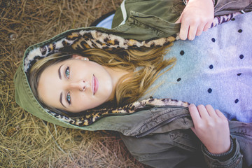 girl lying on the grass