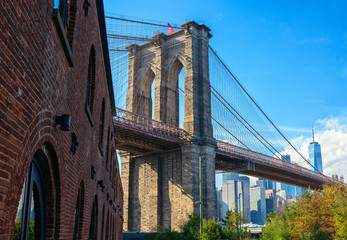 Brooklyn Bridge in sunny day taken from Brooklyn Bridge Park,  New York City, United States.