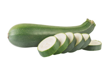 Whole ripe green zucchini with slices isolated