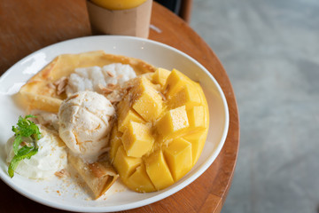 Thai mango Crepe with ice cream in Dessert restaurant.