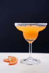 orange margarita cocktail on table