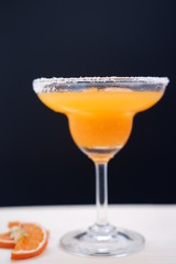 orange margarita cocktail on table