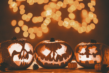 Three spooky pumpkin jack-o'-lanterns made for halloween
