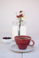 coffee cup with milk on table