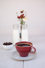 Fototapeta na wymiar coffee cup with milk on table