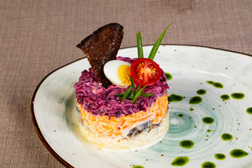 Russian traditional salad with herring