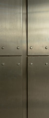 Metallic plates with rivets