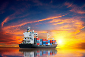 Cargo ship carrying container and running for export  goods  from  cargo yard port to other ocean...