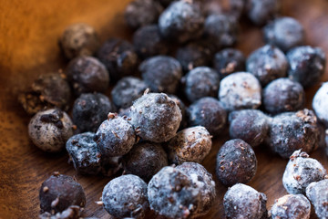 Black Raw Tapioca Pearls in Wooden Bowl.