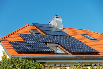 a house with solar panels on the roof