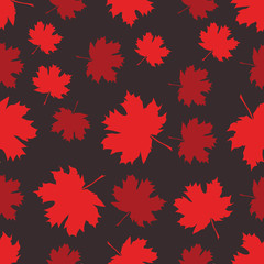 Seamless pattern with autumn maple leaves. Red and scarlet leaves on dark background. Vector illustration